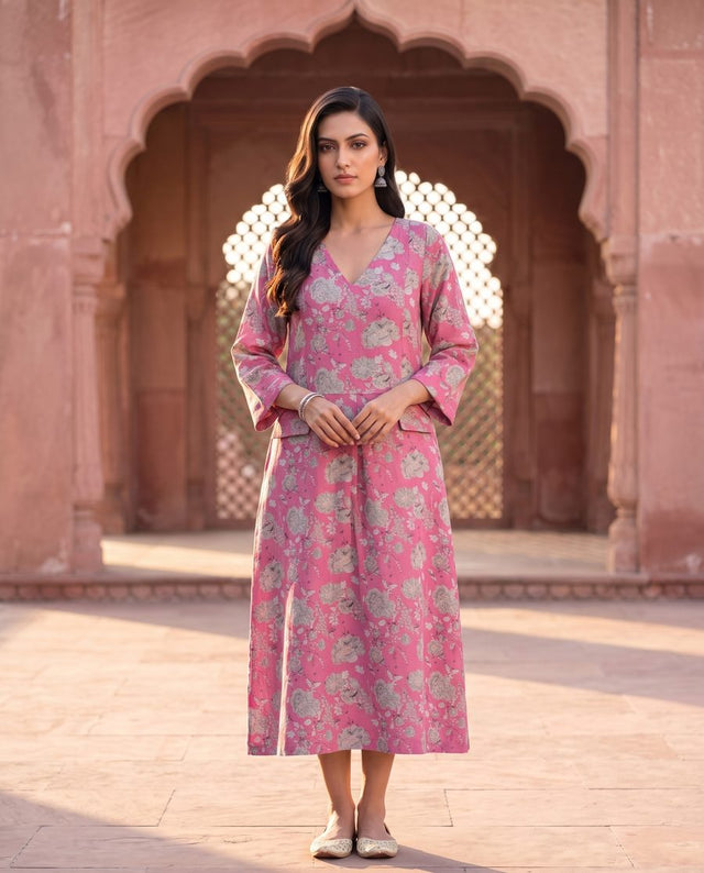 Front view of pink dress with grey floral print, v-neck and 3/4th sleeves