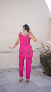 Fuchsia pink sleeveless cotton co-ord set with gold and green flower boota embroidery