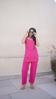 Fuchsia pink sleeveless cotton co-ord set with gold and green flower boota embroidery