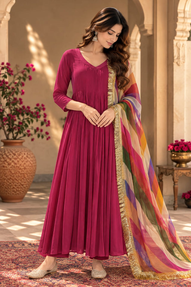 Rani Pink Flared Kurta With Rainbow Leheriya Dupatta - front view