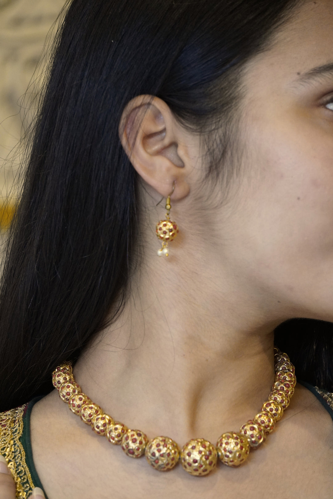 Golden choker with earring